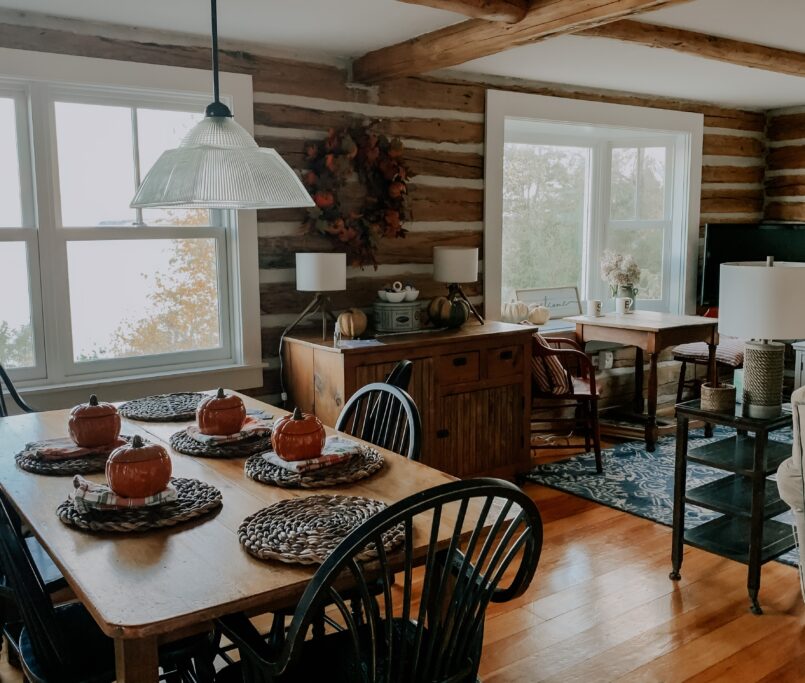 Cute fall dining room with hardwood flooring